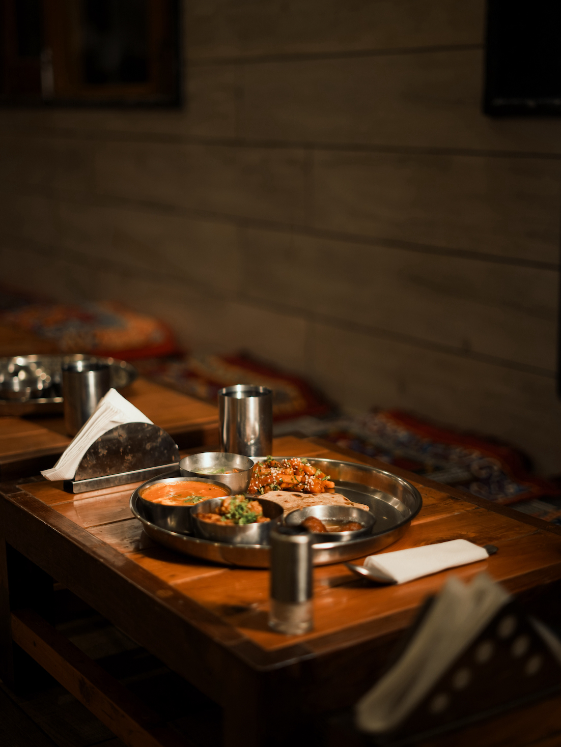 Traditional sattvic vegetarian thali plate served at the ashram dining hall
