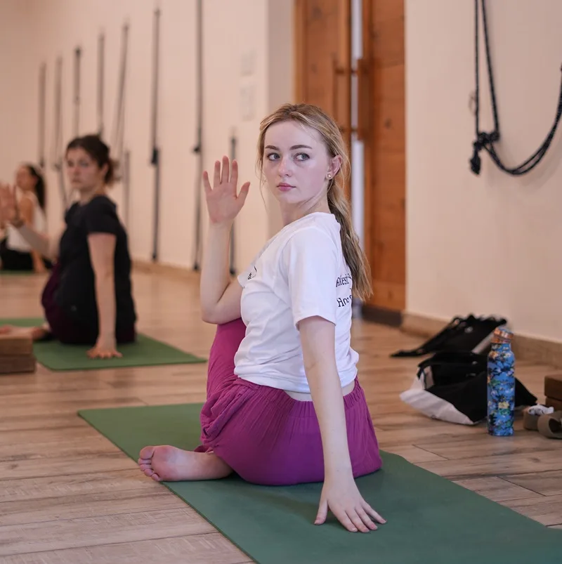 Students doing asana practice at Rishikesh Yogpeeth