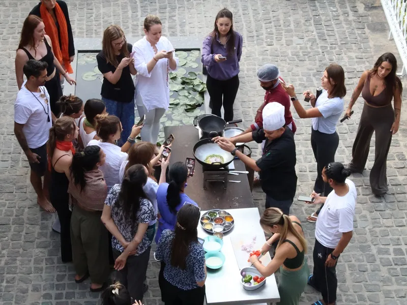 Students learning Ayurvedic cooking at Rishikesh Yogpeeth