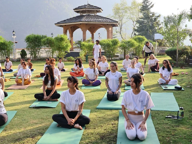 Group yoga retreat in India with international students