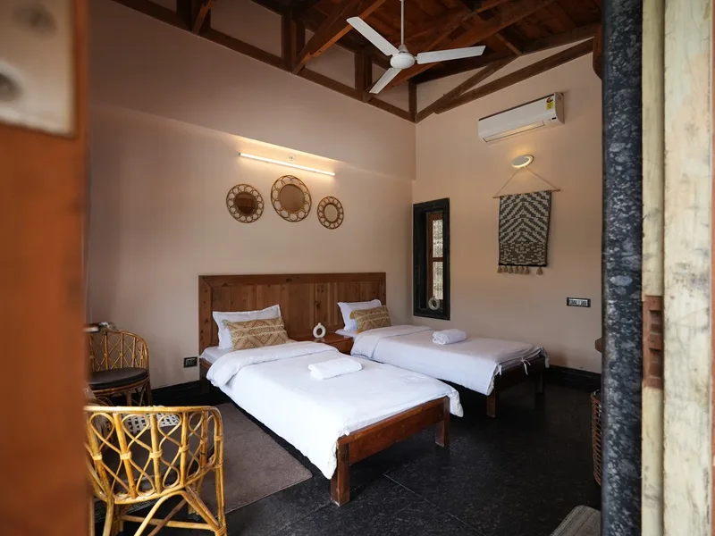 Comfortable ashram accommodation room at Rishikesh Yogpeeth