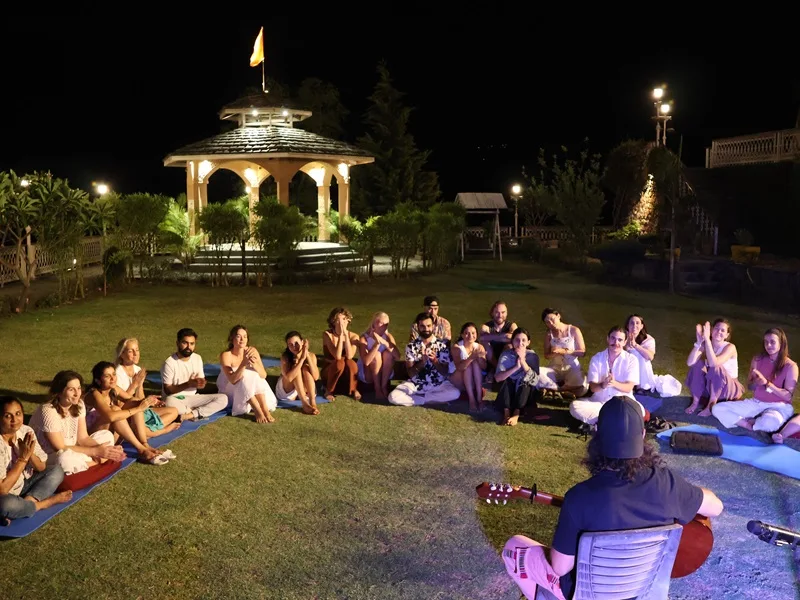 Relaxing yoga class at Abhayaranya Yoga Ashram in Rishikesh