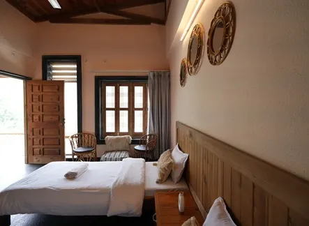Luxury private accommodation at Abhayaranya Yoga Ashram in Rishikesh with modern amenities and serene views